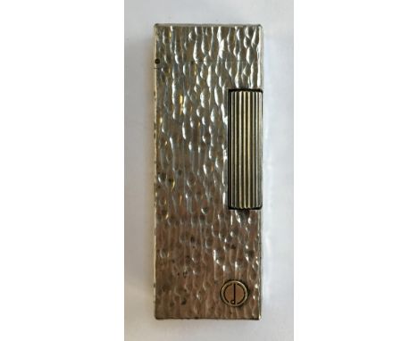 A silver plated Dunhill Rollagas lighter, with bark effect finish, 6.3cmH 