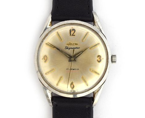 A FELCA SKYMASTER STEEL WRIST WATCH Circa 1950s, Silvered dial, dagger hands, baton markers, arabic numbers on quarters.Movem