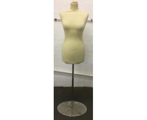 A tailors female mannequin on metal base; together with a folding garden table 