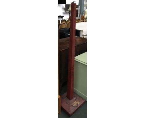 A red painted tapered square section standard lamp base, with gilt decoration depicting a pagoda, 155cmH 