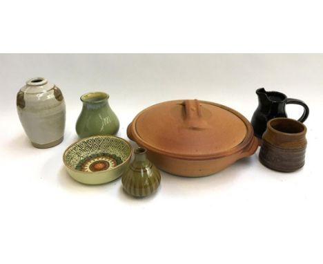 A large John Leach Muchelney Pottery casserole dish, together with other studio pottery items 