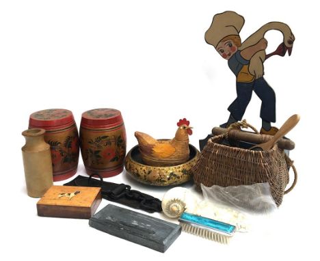 A mixed lot to include painted wooden and papier mache items, wicker basket, a bag of cowry shells, a large shell, etc 