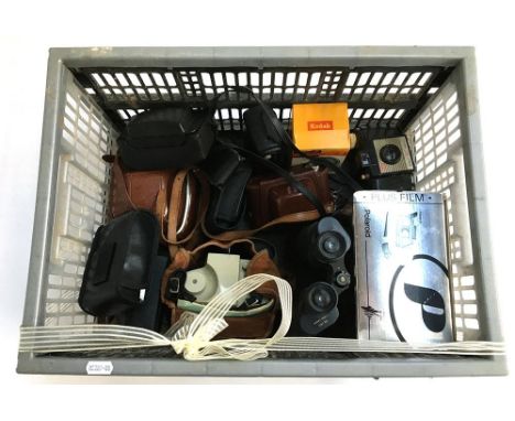 A Kodak Instamatic 33 35mm camera; a Kodak Brownie 127; a Kodak Brownie Cresta 3 in carry case; Kodak Brownie flash holder 5;