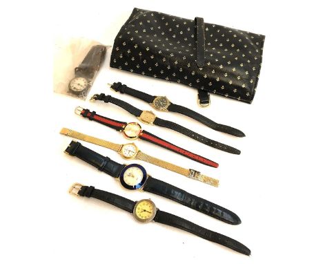 A quantity of ladies wrist watches in a leather wallet, to include Lorus, Timex, etc, and a converted gob watch 
