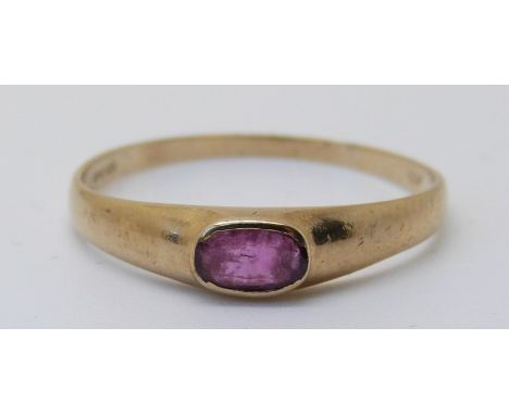 A 9ct gold ring set with a ruby, size R, 1.06g 