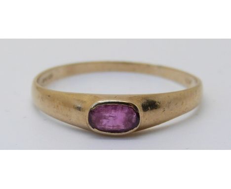 A 9ct gold ring set with a ruby, size R, 1.06g 