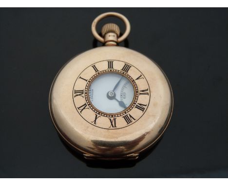 J W Benson 9ct gold keyless winding half hunter gentleman's pocket watch with black enamel Roman numerals to the case and whi