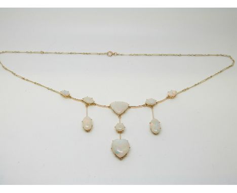 An Victorian/ Edwardian necklace set with oval, triangular and a heart shaped opal cabochons, in original box for Ogden Harro