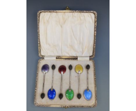 A cased set of six hallmarked silver and guilloché enamel coffee bean spoons, Birmingham 1932 maker William Suckling Ltd, wei