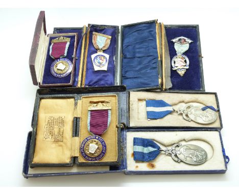 A quantity of hallmarked silver and enamel Masonic medals, lodges include Carnarvon Lodge 1921 commemorative, CLMMM x2, 1919 