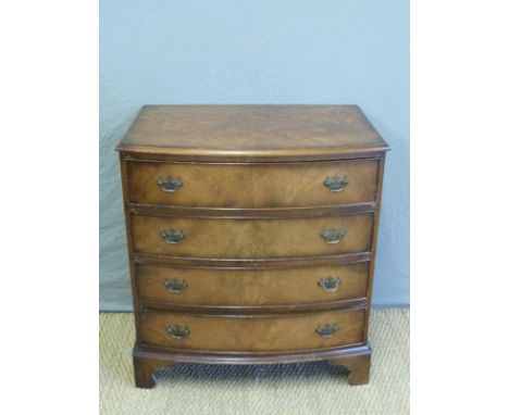 A bow fronted chest of four drawers, W67 x D50 x H83cm