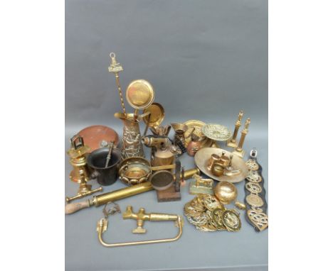 A collection of brassware to include blow lamp, horse brasses, garden sprayer, embossed jug, decorative items etc