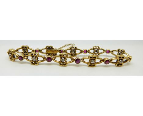 A French 18ct gold bracelet set with alternating round cut diamonds and rubies in a stylised bow design, 19.8g