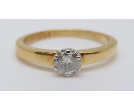 An 18ct gold ring set with a round cut diamond of approximately 0.25ct (size L) 