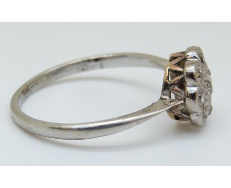 An 18ct white gold ring set with diamonds in a cluster (size R) 