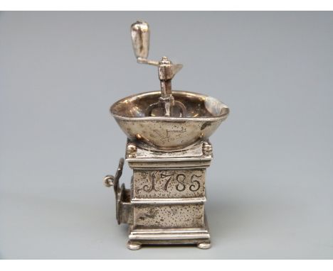 A white metal novelty coffee grinder with rotating mechanism marked with Medusa-Oro, star and 175 AR 925, height 62mm, weight