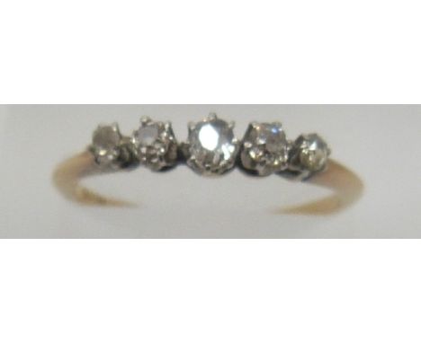 An 18ct gold ring set with five diamonds, 1.57g (size M/N)