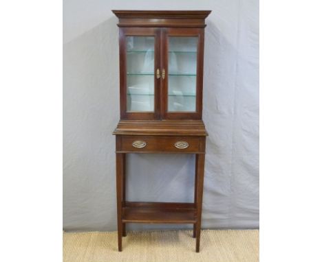 A late 19th / early 20thC display cabinet on stand, stand fitted single drawer raised on square tapering legs united by a she