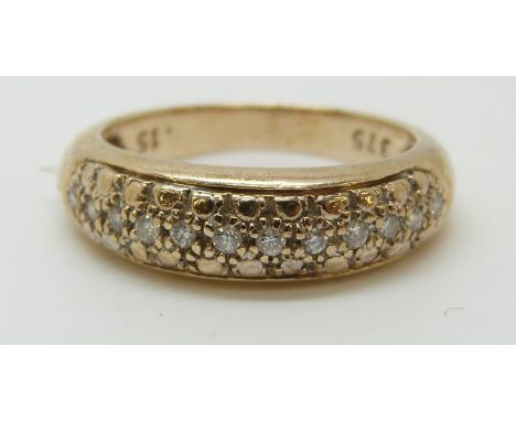 A 9ct gold ring set with diamonds, 3.88g (size N) 