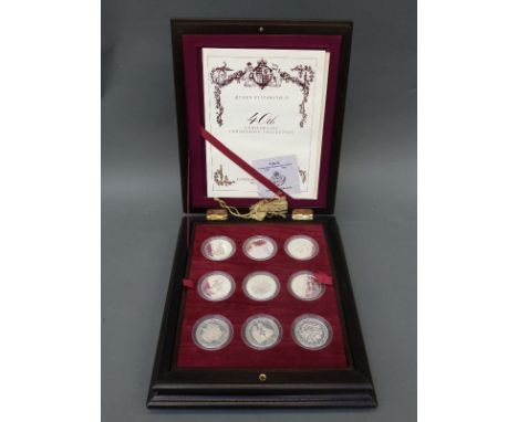 Queen Elizabeth II 40th Anniversary Coronation crown collection comprising eighteen Royal Mint crown sized coins with certifi