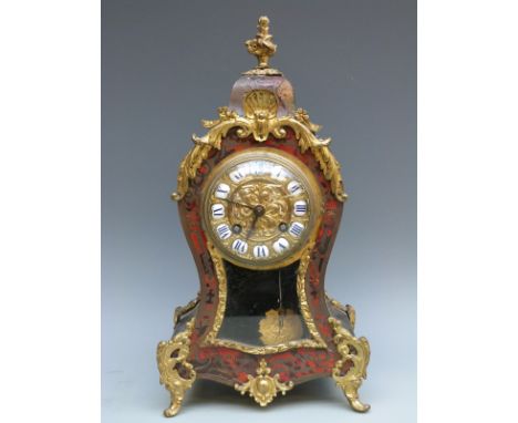 French 19thC mantel clock with Boulle work decoration to front of ebonised balloon style case, the brass decorated dial with 