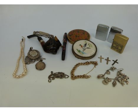 A Victorian silver locket, silver bracelet, and charm bracelet, costume jewellery, Zippo lighter, pen, pipe, etc