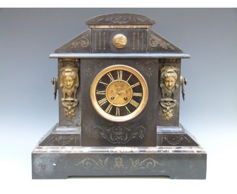 A large French 19thC two-train slate mantel clock with visible escapement. One self-coloured Roman chapter ring with gold col