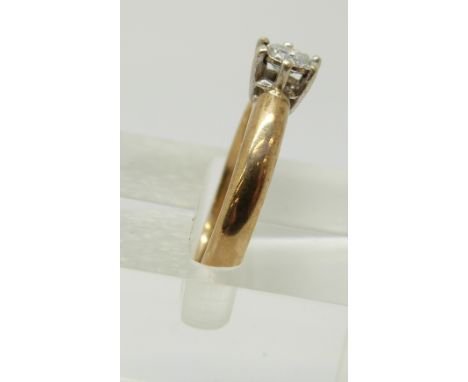 An 9ct gold ring set with a round cut diamond of approximately 0.2ct, 2.72g  (size K)