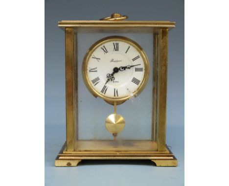 Rapport c1960s single train brass carriage style clock with pendulum and keyless 8-day movement. The Roman white enamel dial 