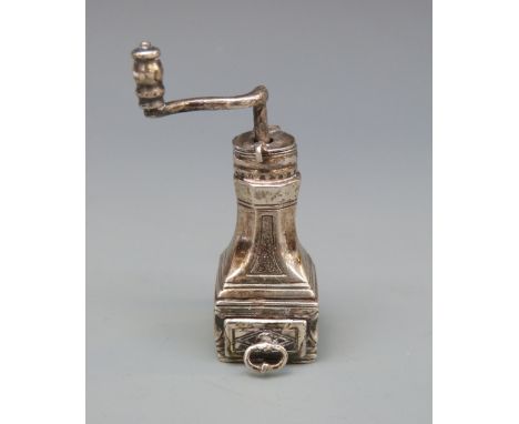 A white metal novelty coffee grinder with rotating mechanism marked with Medusa-Oro, star and 175 AR 925, height 60mm, weight