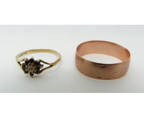 A 9ct gold wedding band ( size Q) and a 9ct gold ring set with a diamond and sapphires in a cluster (size J), 3.6g 