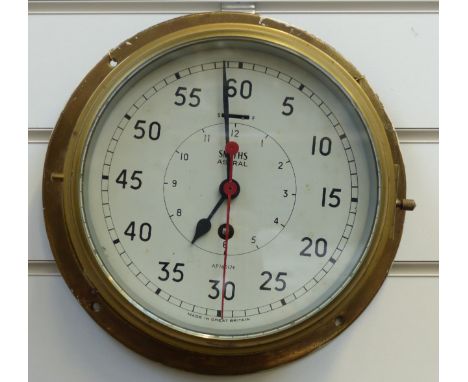 A Smiths Astral mid to late 20thC brass cased ship's style bulkhead / ship's clock, the painted Arabic dial with bold seconds