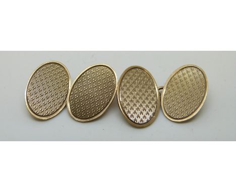A pair of 9ct gold cufflinks with engine turned decoration, 5.6g