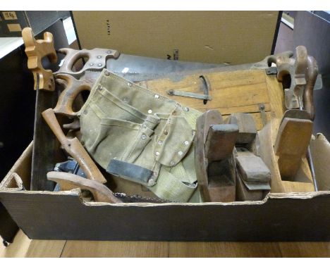 A qunatity of vintage woodworking tools including planes, saws, etc 