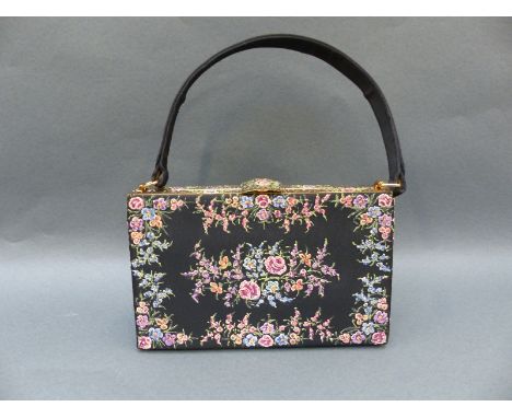A 1950s 'Waldybag' evening bag with floral decoration, containing a matching Stratton compact, lipstick and cigarette case 