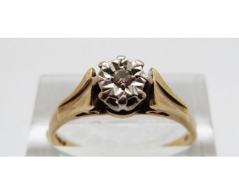 An 18ct gold ring set with a diamond in an illusion setting, size R, 4g 