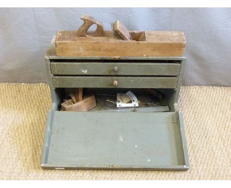 A vintage tool chest and contents including brass inlaid square, planes etc, width of box 63cm 
