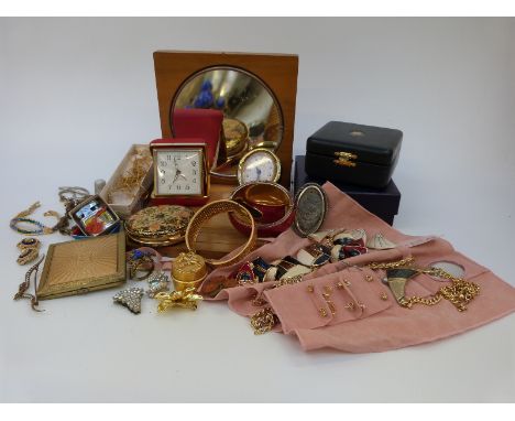 A collection of costume jewellery to include compacts, chains, Fabergé box, brooches etc