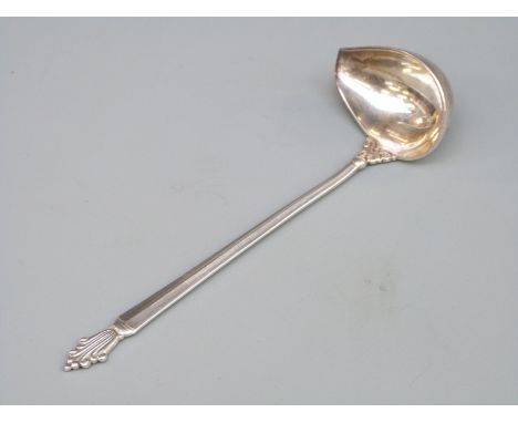 A Georg Jensen hallmarked silver sauce ladle with GI and 925 marks and also import marks for London 1931, length 13cm, weight