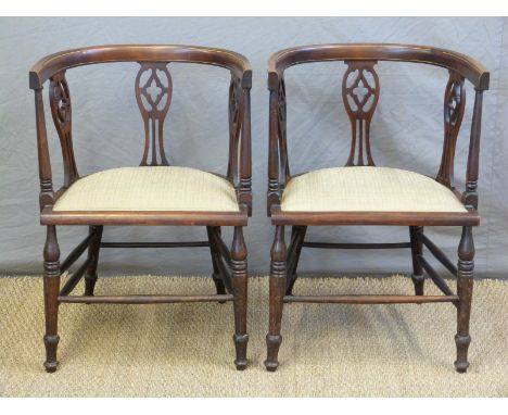 A pair of late 19thC bow backed inlaid armchairs