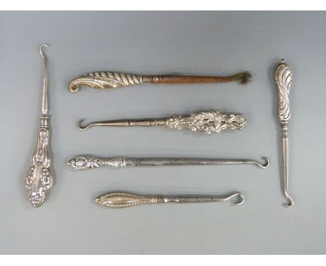 Six various hallmarked silver handled button hooks