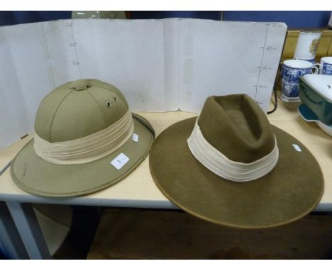 Tropical pith helmet and another hat. 