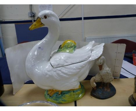 Ceramic punch bowl modelled as a swan and a metal door stop modelled as ducks.