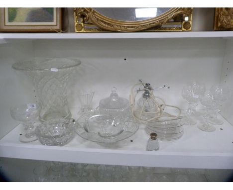 Glassware to include a vase, Regency-style etched glass goblet, ice plates, wine glasses, table lamp etc (one shelf). 