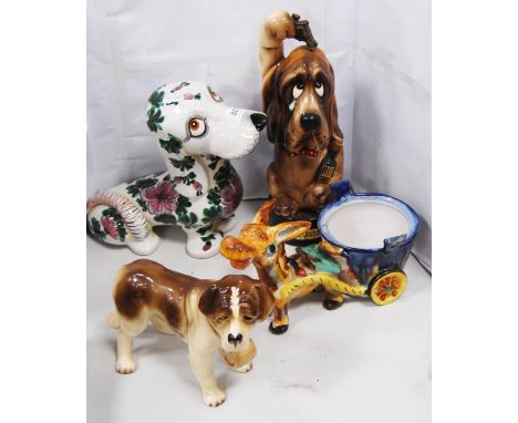 Collection of novelty ceramic dog figures to include 'The Last Shot' musical figure, majolica-style figure group, St Bernard 
