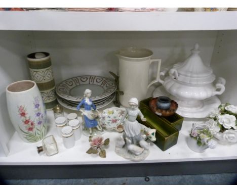 Posy ornament, white glazed tureen with ladle, Spanish-style figures, plates, condiments, Radford's vase etc (one shelf).