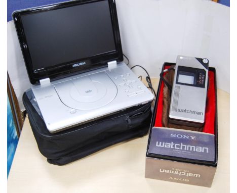 Bush portable DVD player with carry bag and accessories, and a boxed Sony Watchman with pouch. 