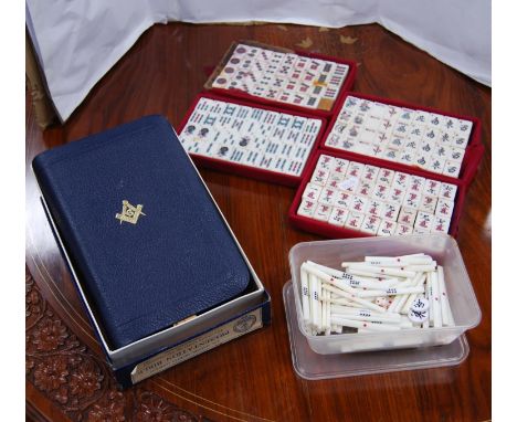 Mahjong set and a Holy Bible with Masonic emblem. 