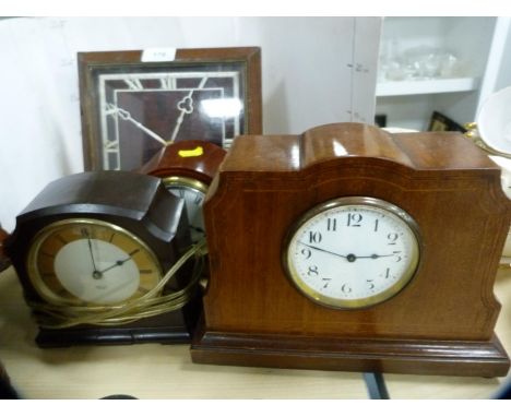 Edwardian mantel clock, another smaller mantel clock, Smith's mantel clock and another on easel support.&nbsp; (4) 