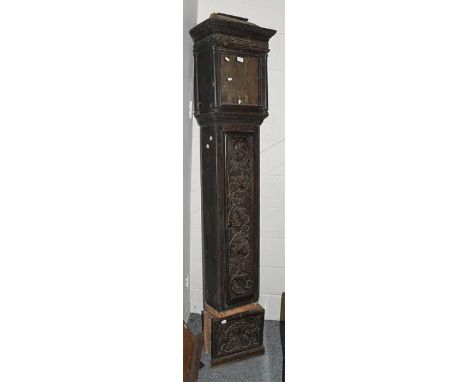 An 18th century carved painted pine longcase clock case